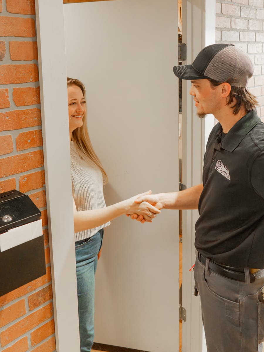 Hot Tub Electrician Meeting Homeowner at The Door