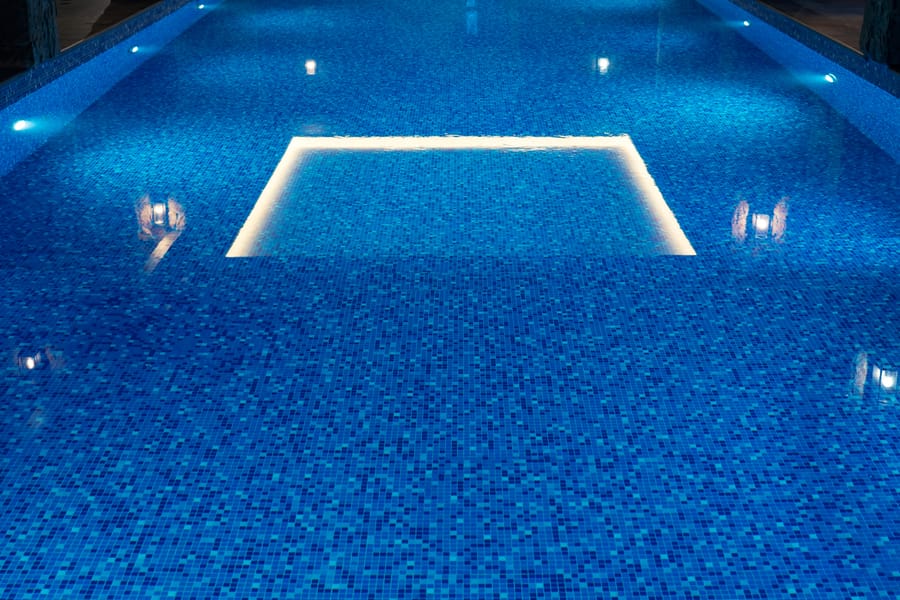 Elegantly lit pool at night